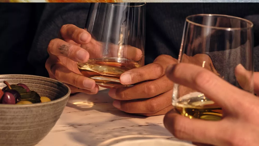 ardray holding glass with blended scotch whisky